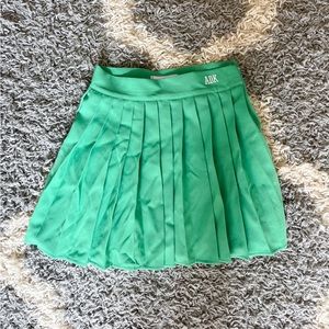 Adika green pleated skirt